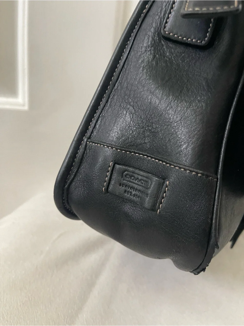 Coach sleek black